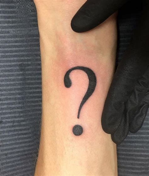 question mark tattoo meaning|divide sign tattoo.